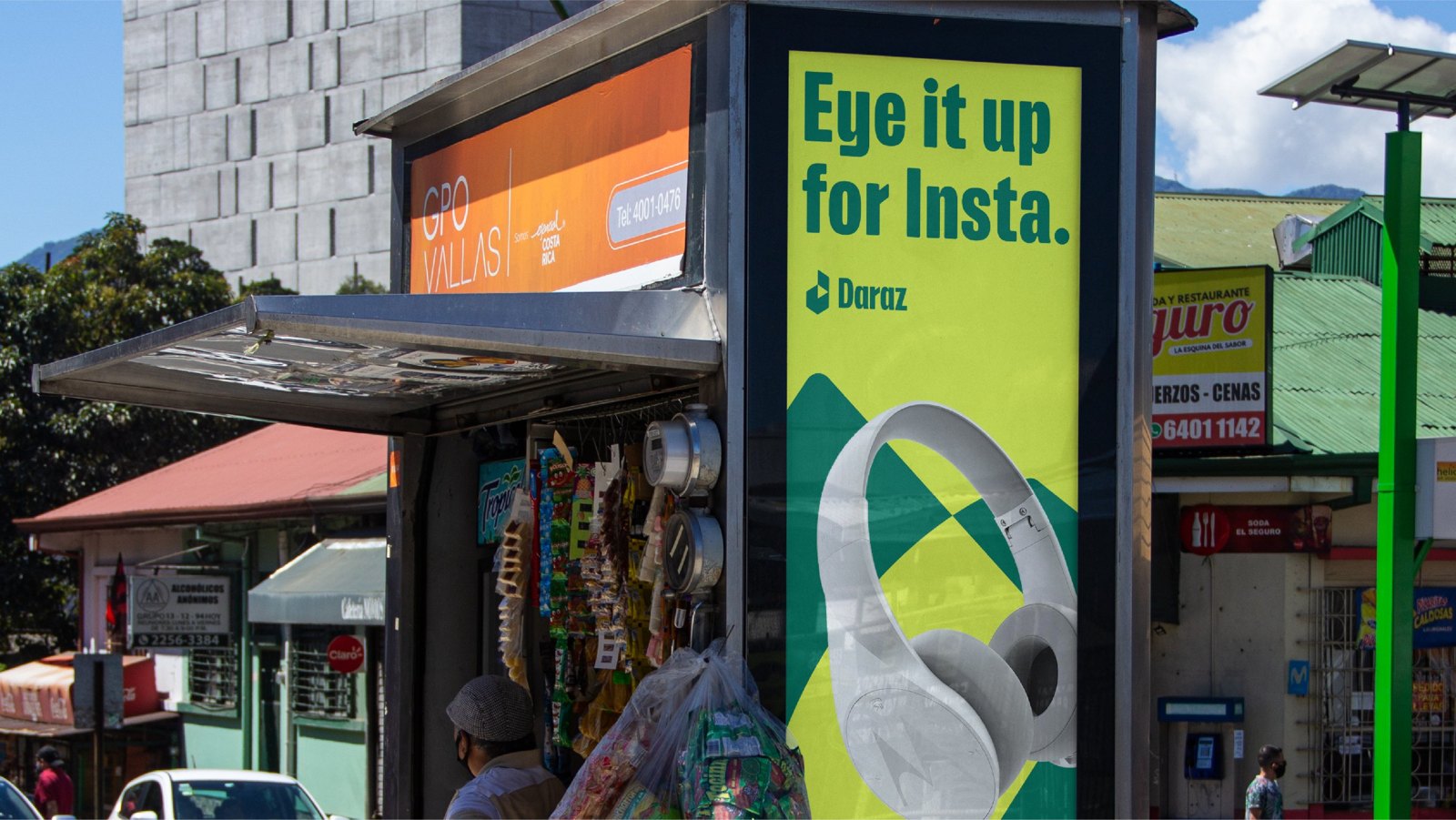 Daraz launch poster reading Eye it up for Insta on a street kiosk